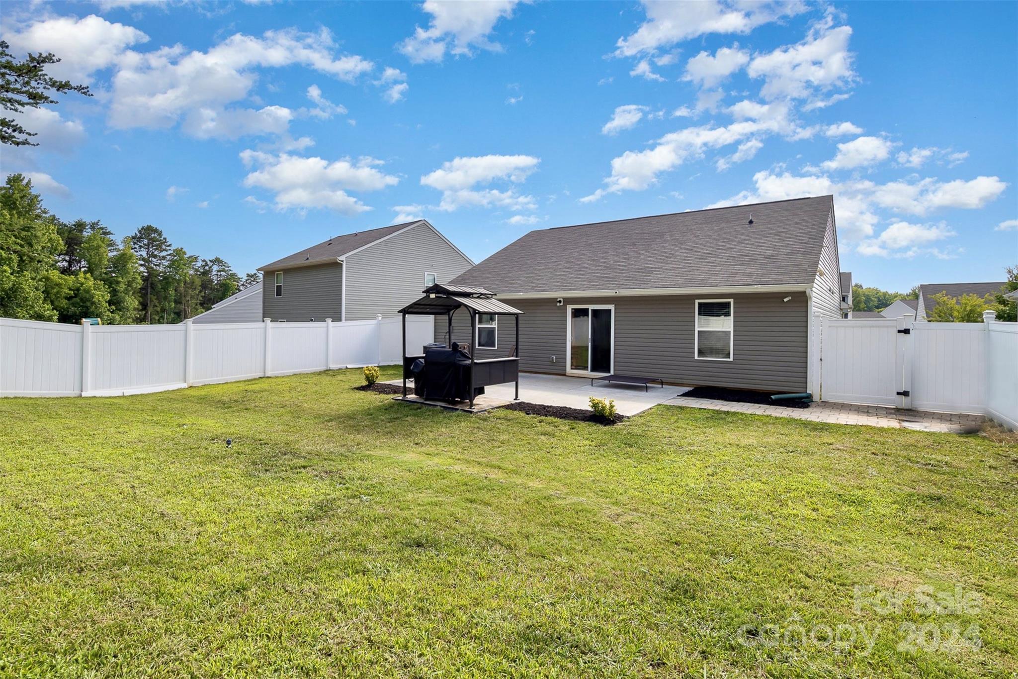 1075 Winding Creek Road Salisbury, NC 28146 - Photo 18 of 18 a house view with swimming pool and garden space
