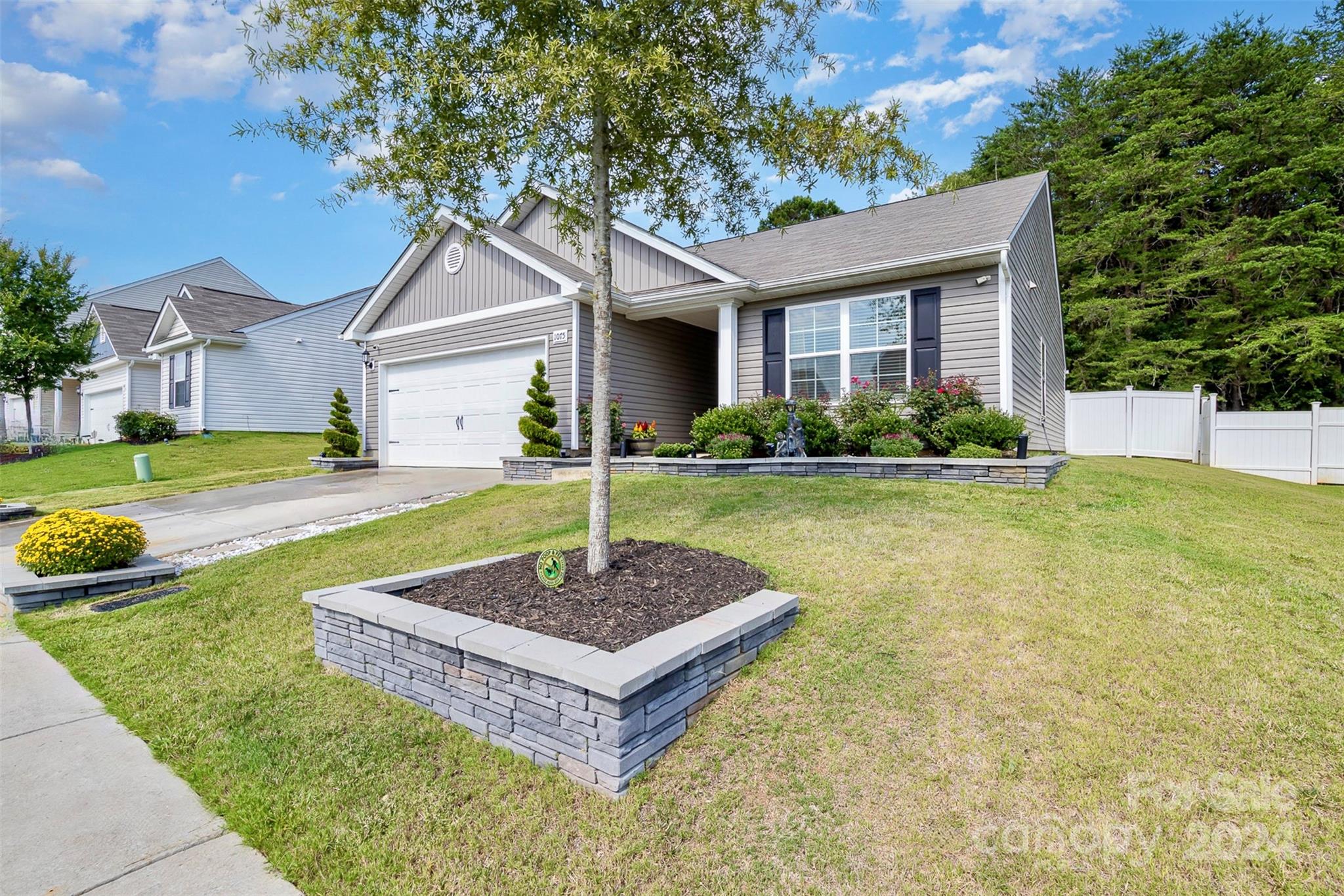 1075 Winding Creek Road Salisbury, NC 28146 - Photo 2 of 18 a front view of a house with a yard