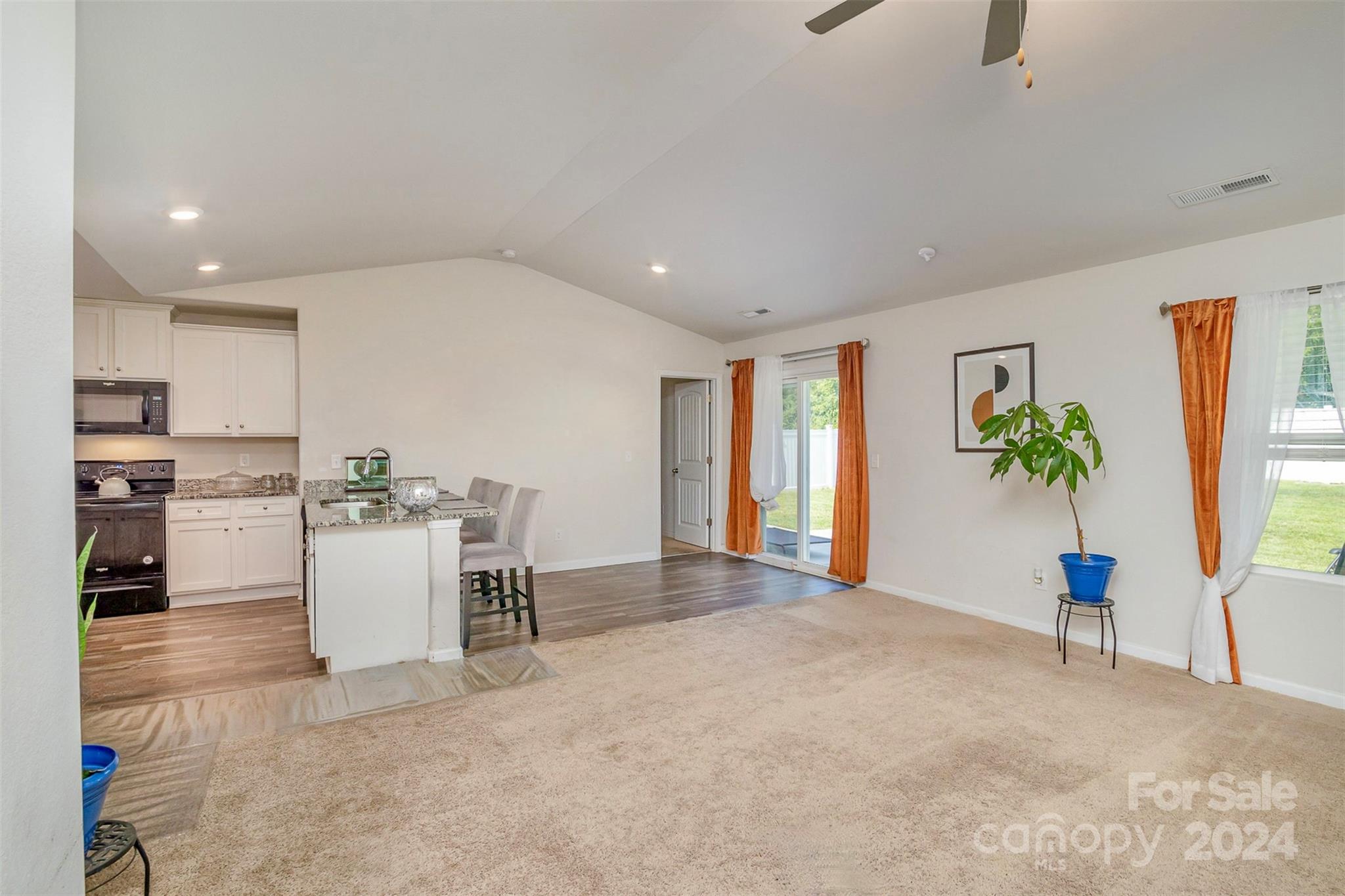 1075 Winding Creek Road Salisbury, NC 28146 - Photo 6 of 18 a view of a kitchen with furniture and a potted plant