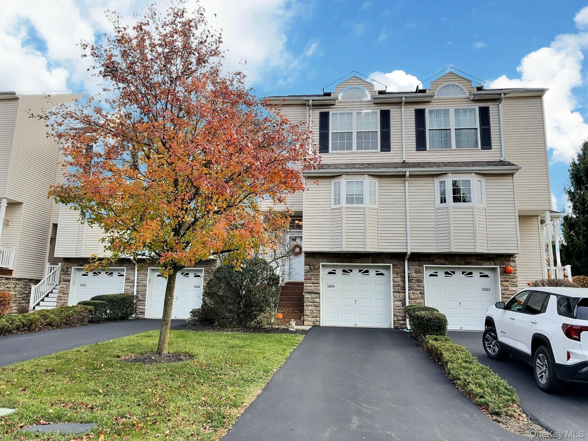 5004 Boulder Way Wappingers Falls, NY 12590 - Photo 1 of 20 a house view with a garden space