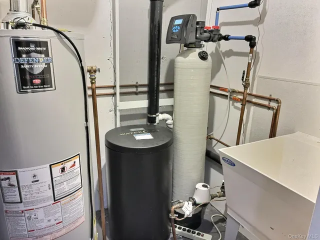 a bathroom with a sink and mirror