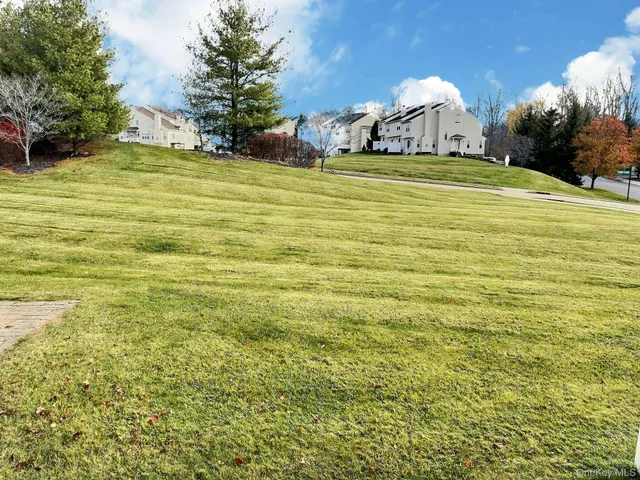 a bathroom with a sink and a yard