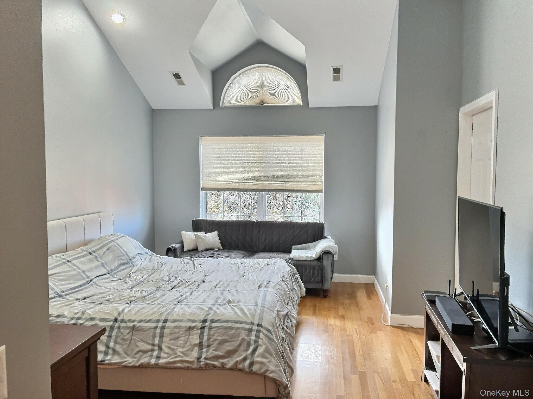 5004 Boulder Way Wappingers Falls, NY 12590 - Photo 8 of 20 a bedroom with a bed and a window