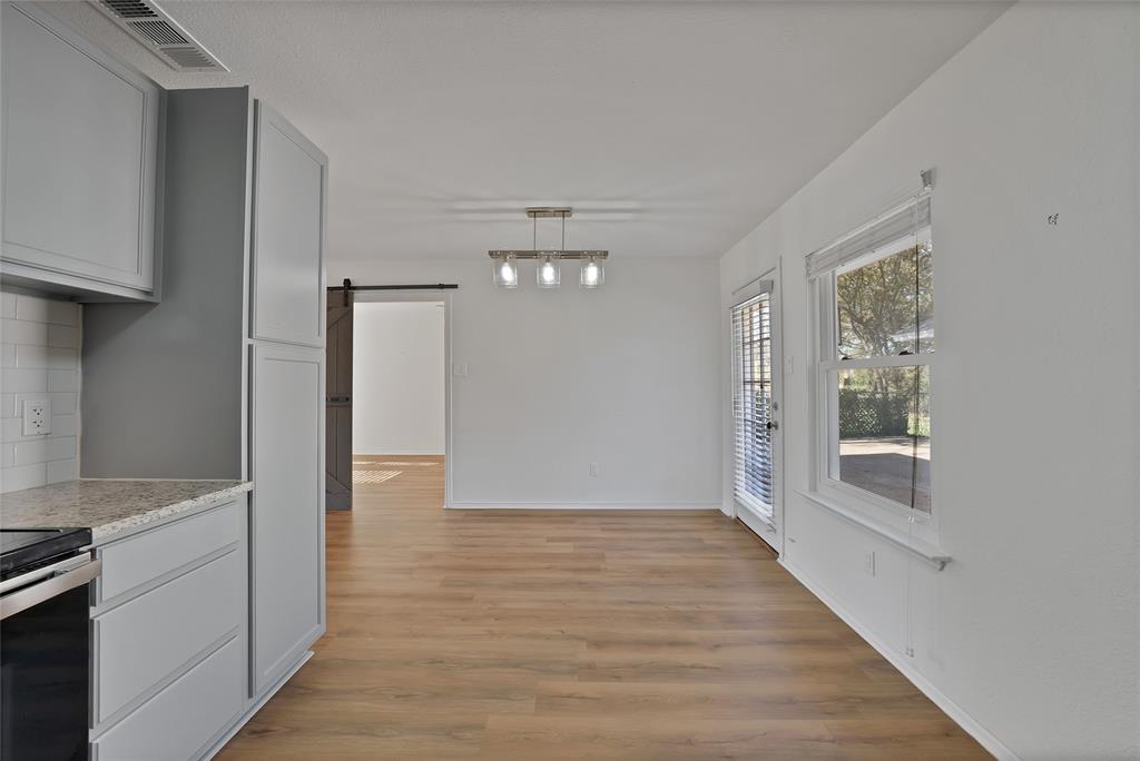 715 East Avenue F Midlothian, TX 76065 - Photo 26 of 33 a view of livingroom with hardwood
