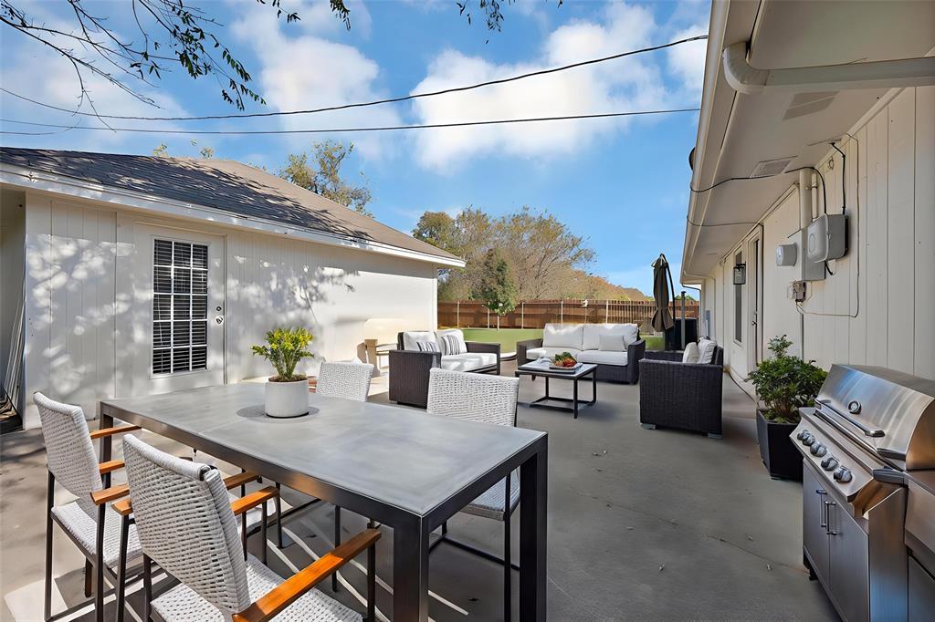 715 East Avenue F Midlothian, TX 76065 - Photo 27 of 33 a view of a terrace with furniture and a potted plant