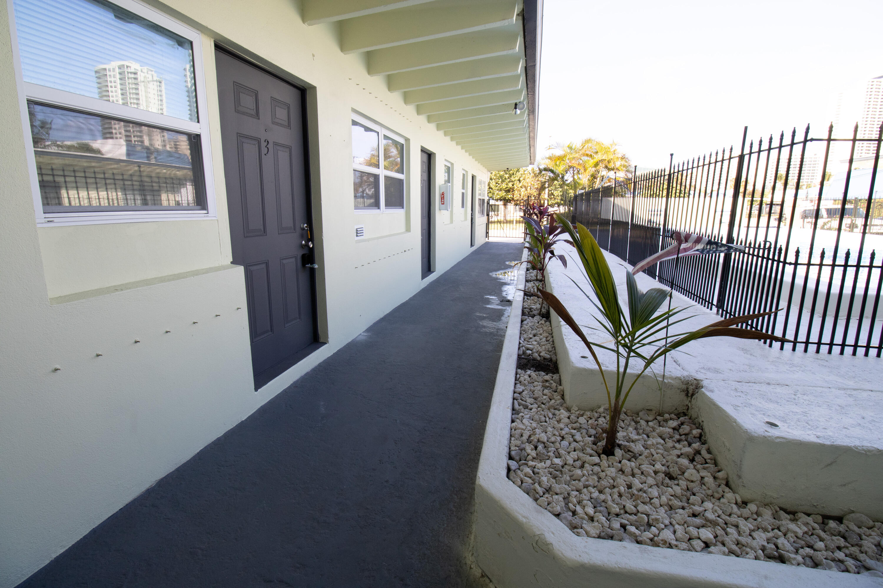 1257 Island Road, Unit 7 Riviera Beach, FL 33404 - Photo 5 of 11 1257IslandRdWalkway