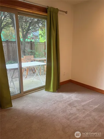 a view of empty room with front door