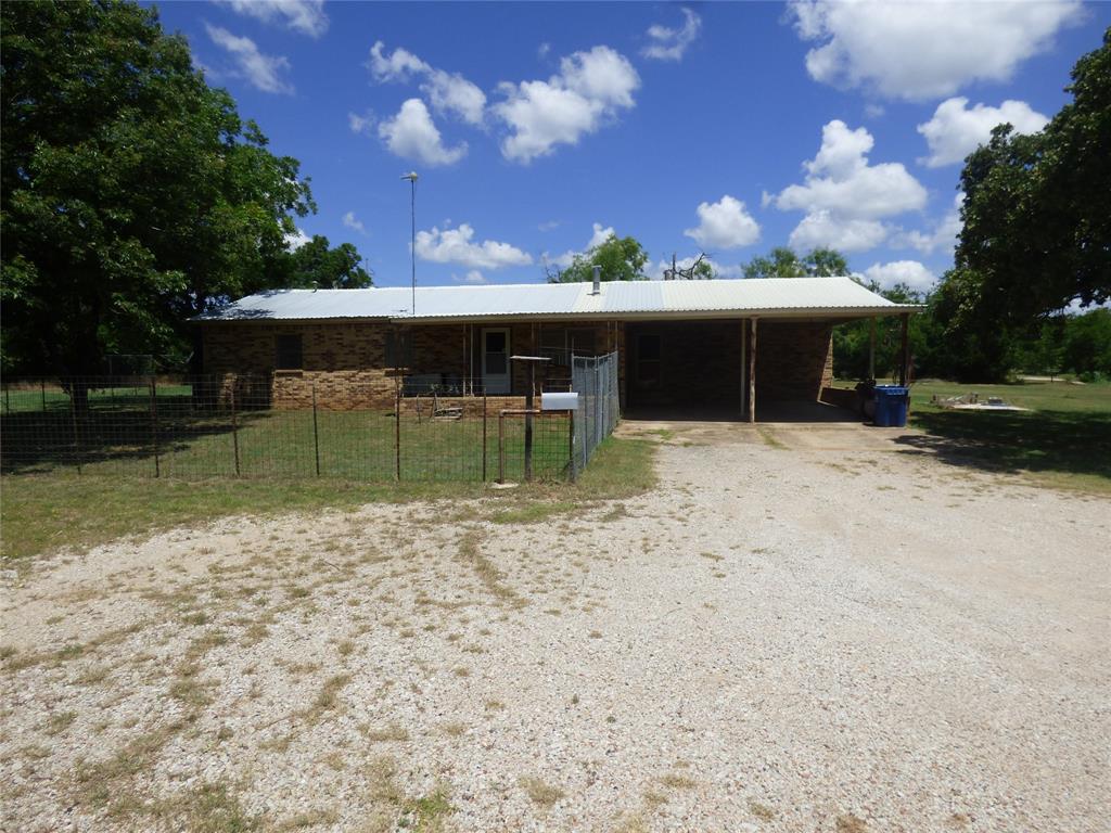 309 East 10th Street Cisco, TX 76437 - Photo 2 of 35 Front view with carport