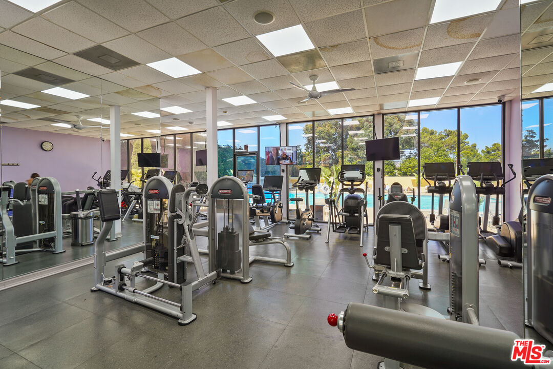 2170 Century Park East, Unit 104 Los Angeles, CA 90067 - Photo 28 of 42 a view of a room with gym equipment