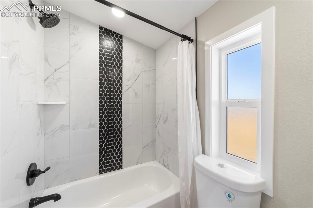 35275 Book Road Yoder, CO 80864 - Photo 13 of 30 a bathroom with a bathtub a sink and a toilet