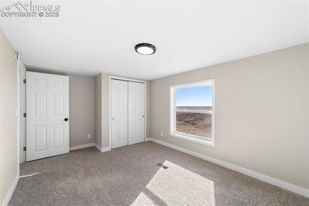 35275 Book Road Yoder, CO 80864 - Photo 15 of 30 a view of an empty room with a window