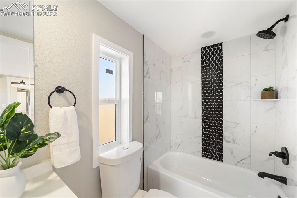 35275 Book Road Yoder, CO 80864 - Photo 23 of 30 a bathroom with a tub sink and toilet
