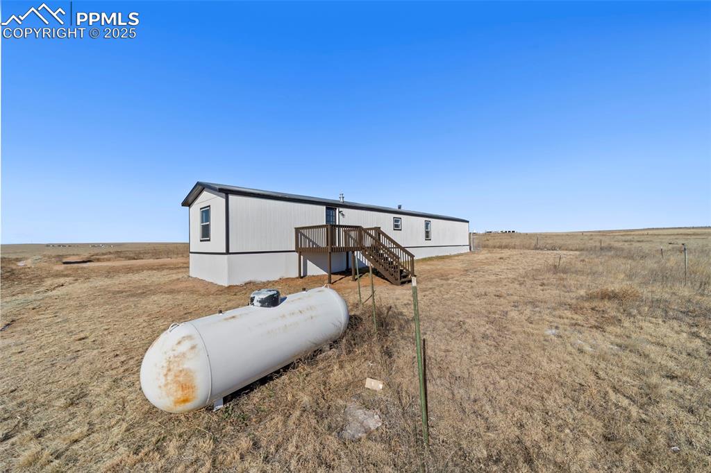 35275 Book Road Yoder, CO 80864 - Photo 28 of 30 a view of a wooden floor and a sink in a room