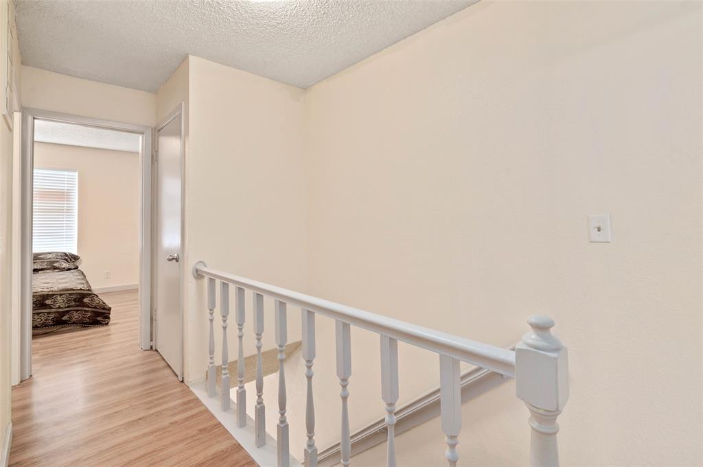 700 West Collins Street Denton, TX 76201 - Photo 19 of 36 Upstairs hallway