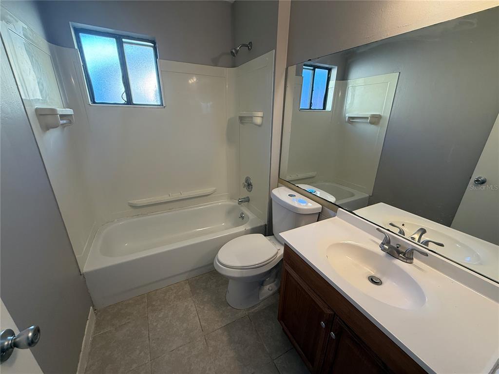 314 San Rafael Street Winter Springs, FL 32708 - Photo 6 of 7 a bathroom with a sink a toilet and shower