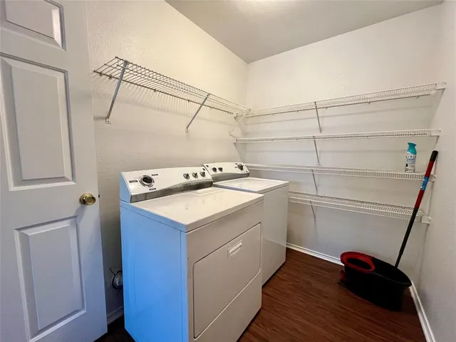 a utility room with dryer and washer