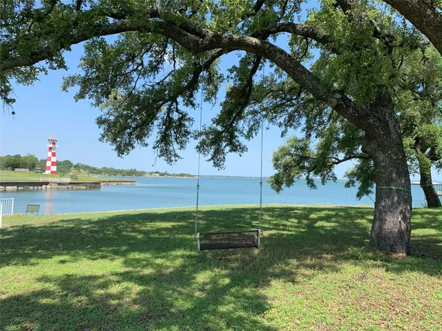 a view of a lake from a yard