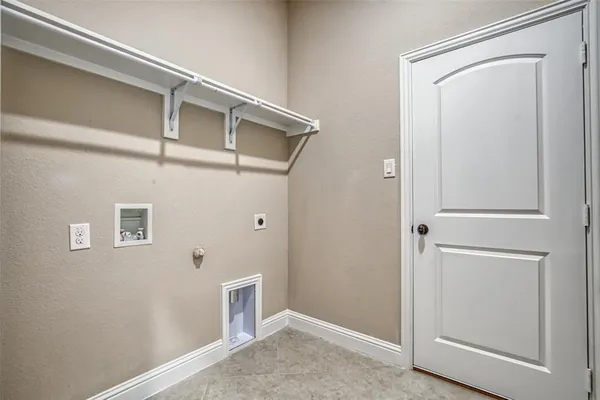 a bathroom with a sink vanity and toilet