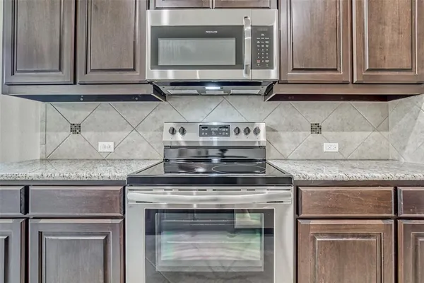 a view of a granite countertop sink