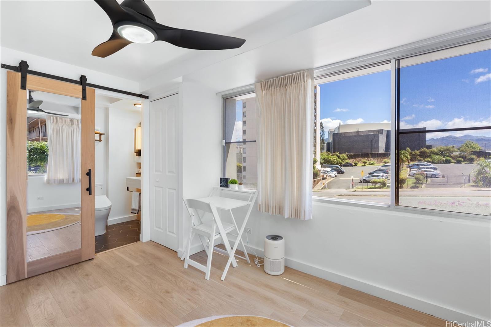 2888 Ala Ilima Street, Unit 611 Honolulu, HI 96818 - Photo 14 of 22 a view of an empty room with a window