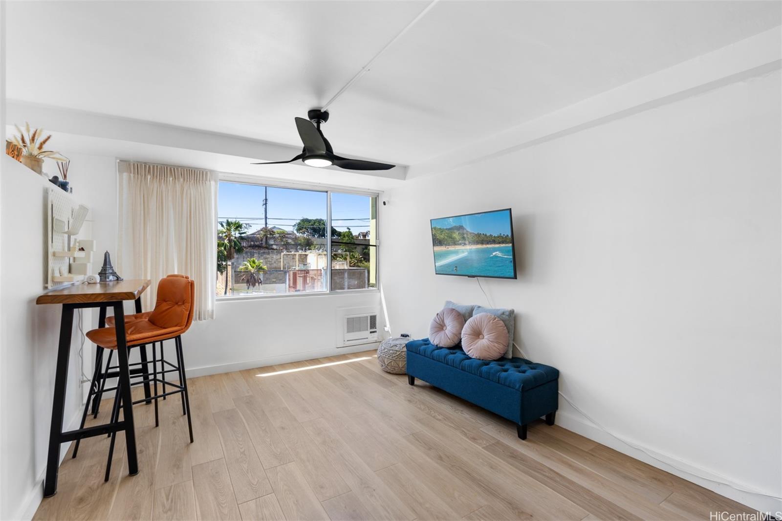 2888 Ala Ilima Street, Unit 611 Honolulu, HI 96818 - Photo 3 of 22 a living room with furniture and a window