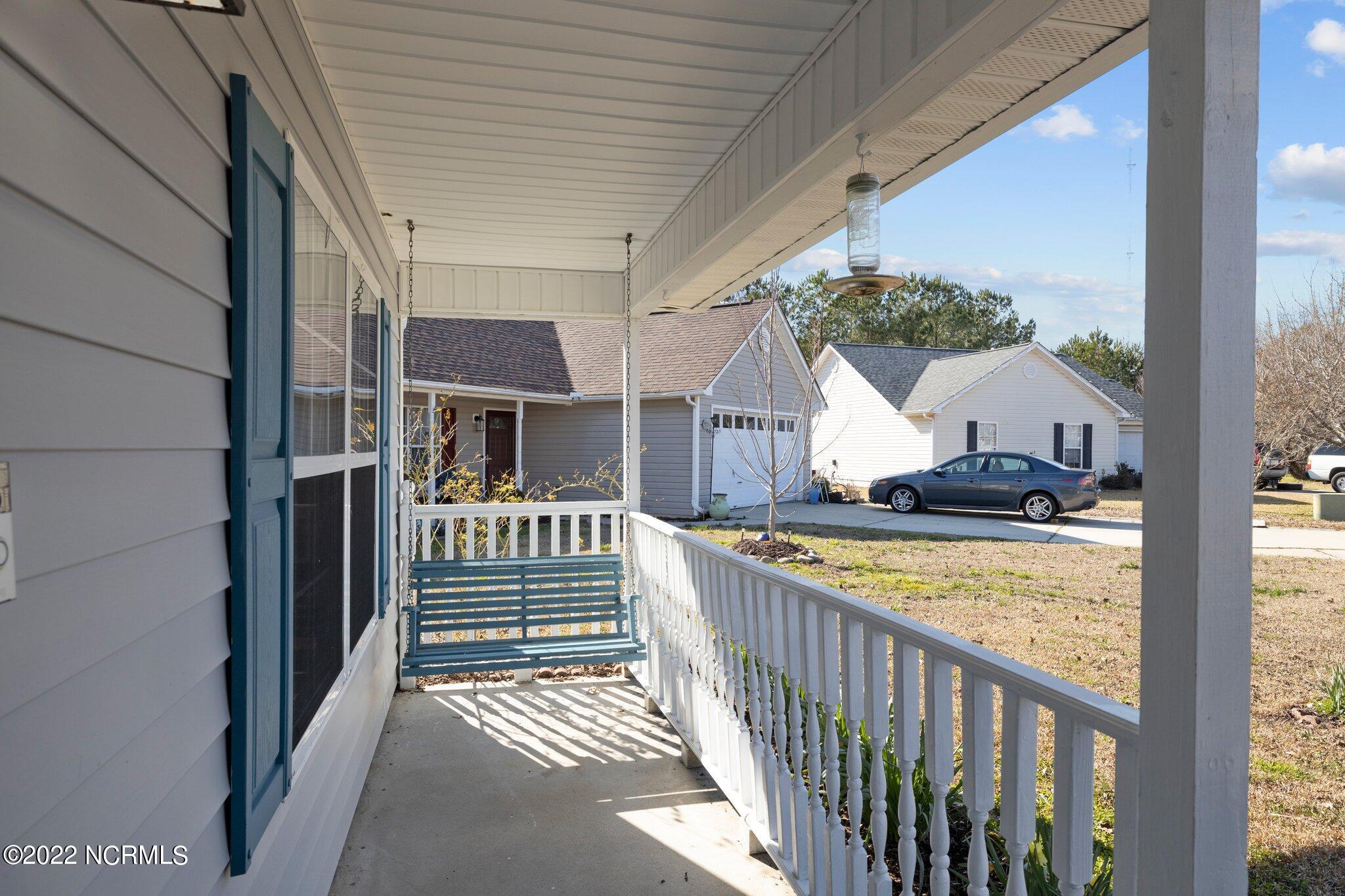203 Foxhall Road Newport, NC 28570 - Photo 5 of 40 Front porch/swing included!