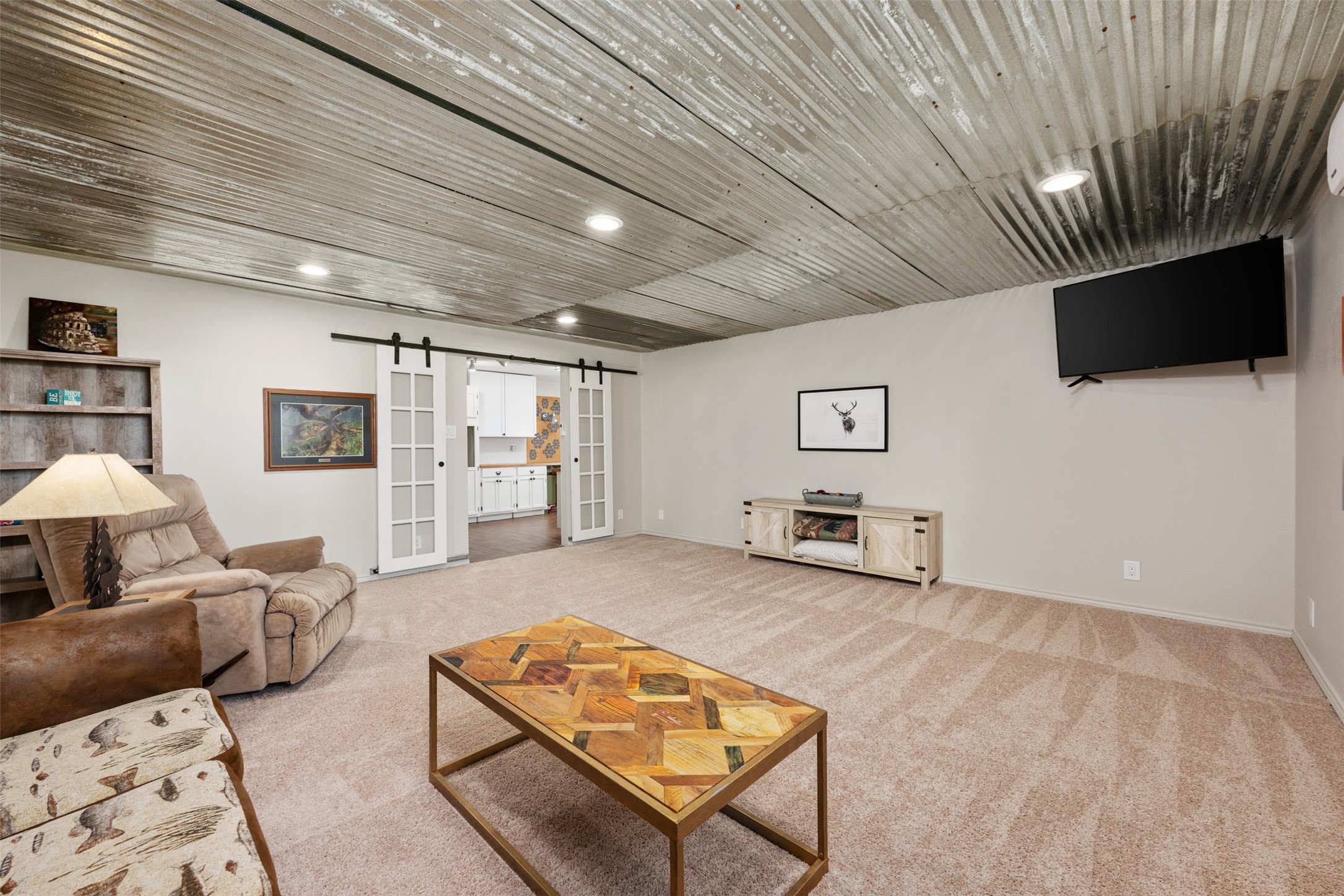 6501 County Road 239 Jarrell, TX 76537 - Photo 23 of 40 2nd Living area with a French doors and new light colored carpet