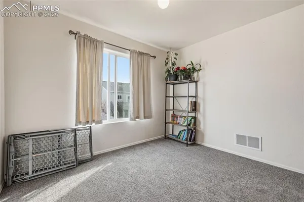 a view of an empty room with window