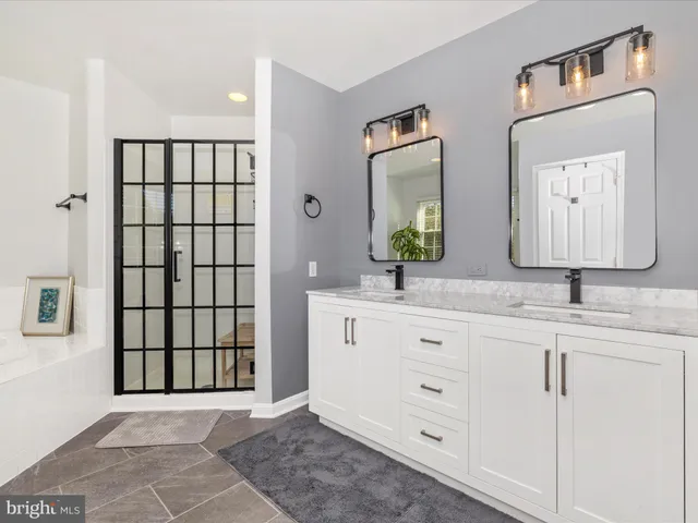 a bed room with a bed and chair