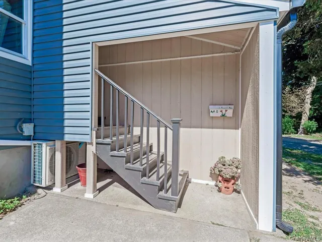 a view of entryway with stairs