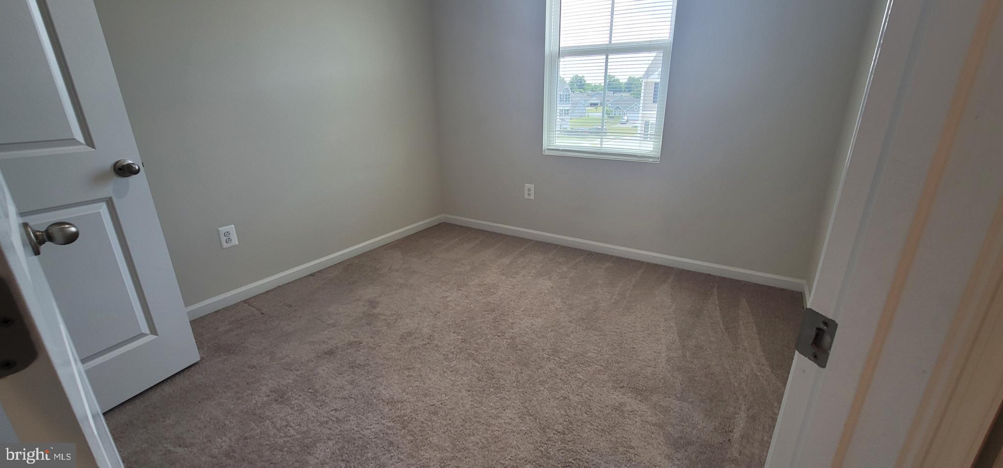 67 Wiggles Court Martinsburg, WV 25403 - Photo 13 of 18 an empty room with a window