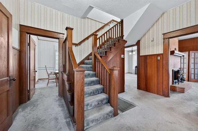 a view of a hallway with staircase