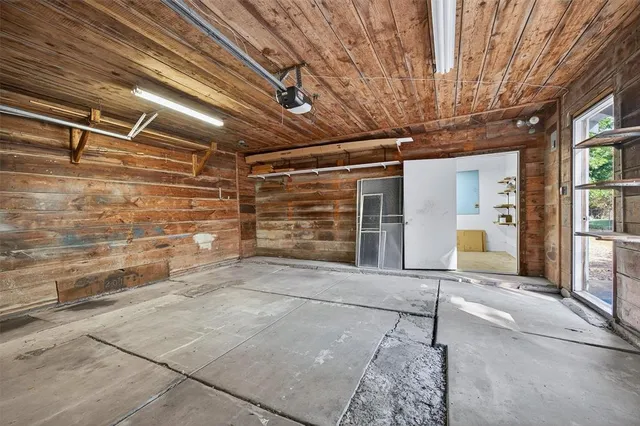 a view of yellow room with wooden walls