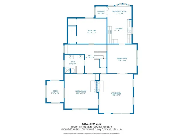 a picture of a bench in front of a house