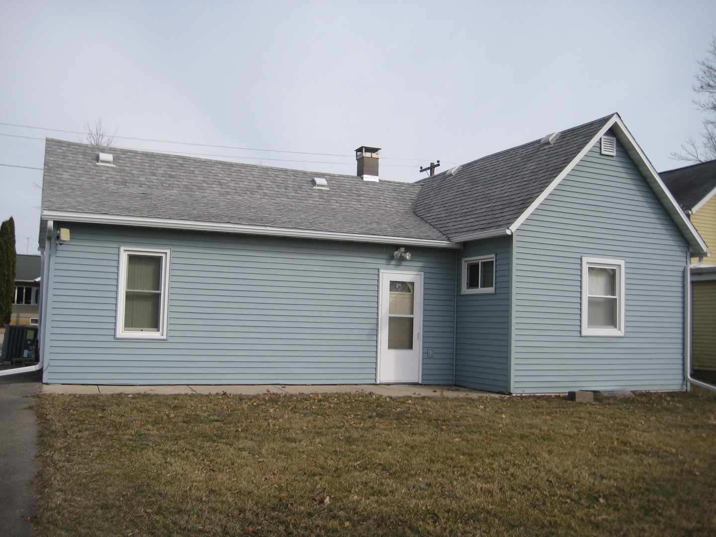 1691 Hoover Road Deer Grove, IL 61243 - Photo 2 of 12 a view of a house with a backyard