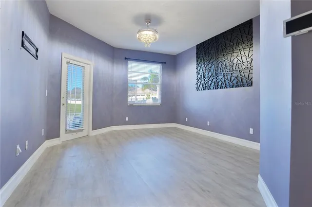 wooden floor and windows in an empty room