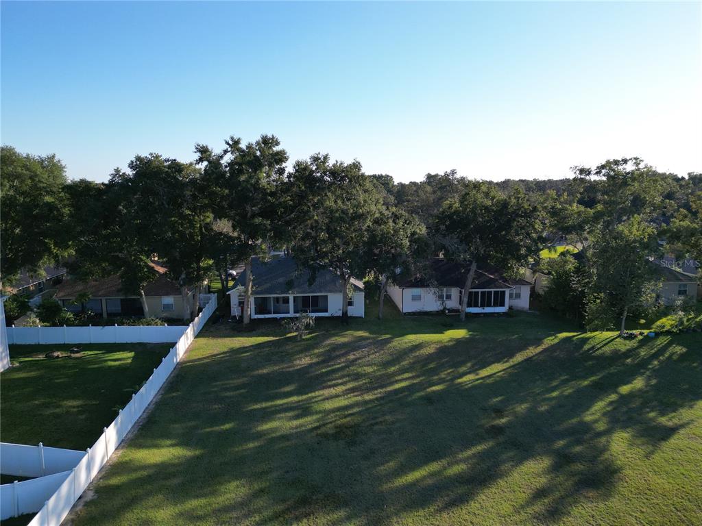 2560 Tall Maple Loop Ocoee, FL 34761 - Photo 32 of 32 a view of a house with a big yard