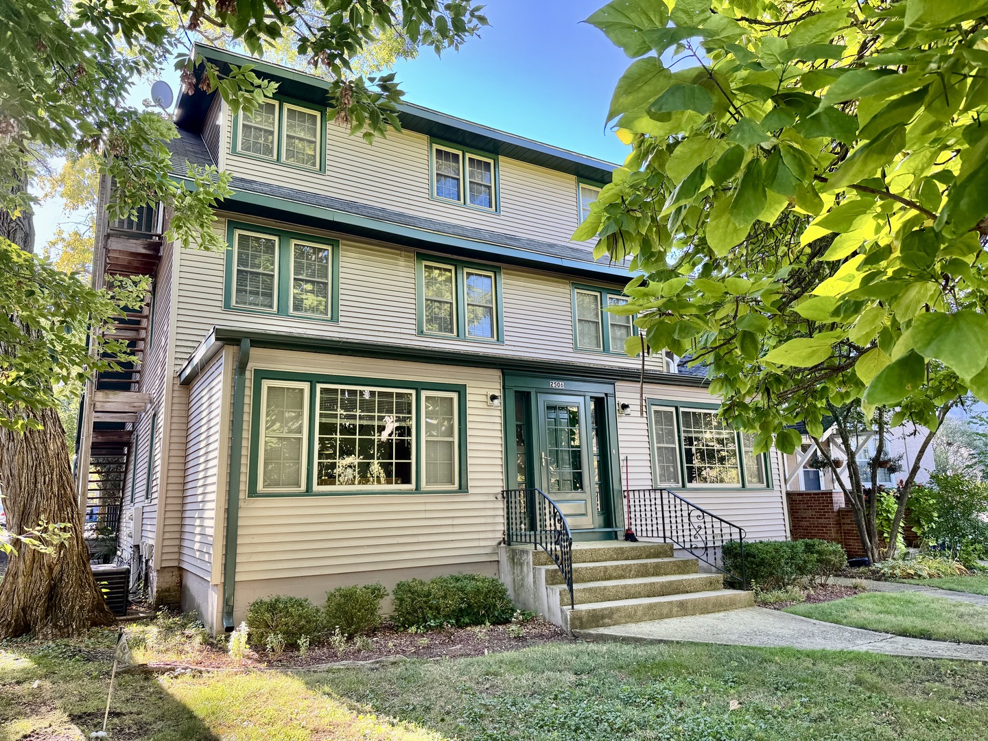 2506 Green Bay Road, Unit 2 Highland Park, IL 60035 - Photo 1 of 11 a front view of a house with a yard