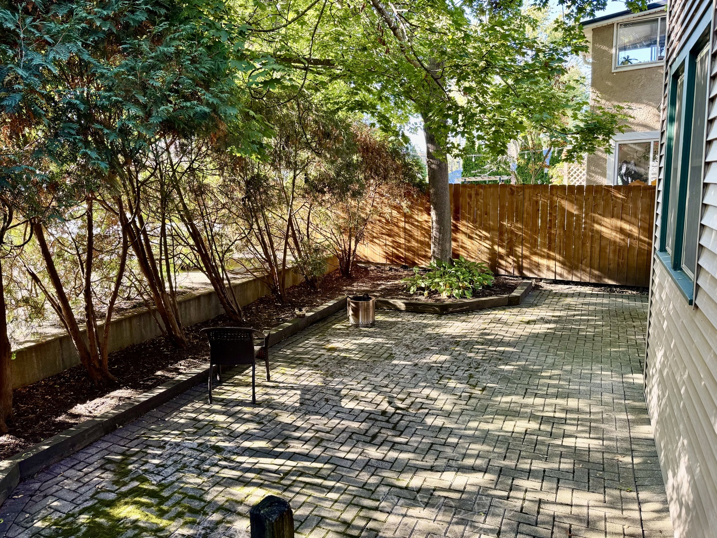 2506 Green Bay Road, Unit 2 Highland Park, IL 60035 - Photo 11 of 11 a view of a wooden fence with trees