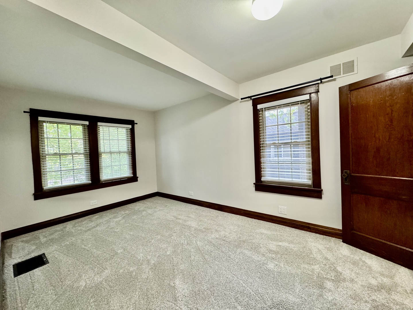 2506 Green Bay Road, Unit 2 Highland Park, IL 60035 - Photo 8 of 11 an empty room with windows