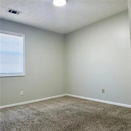 an empty room with a workbench