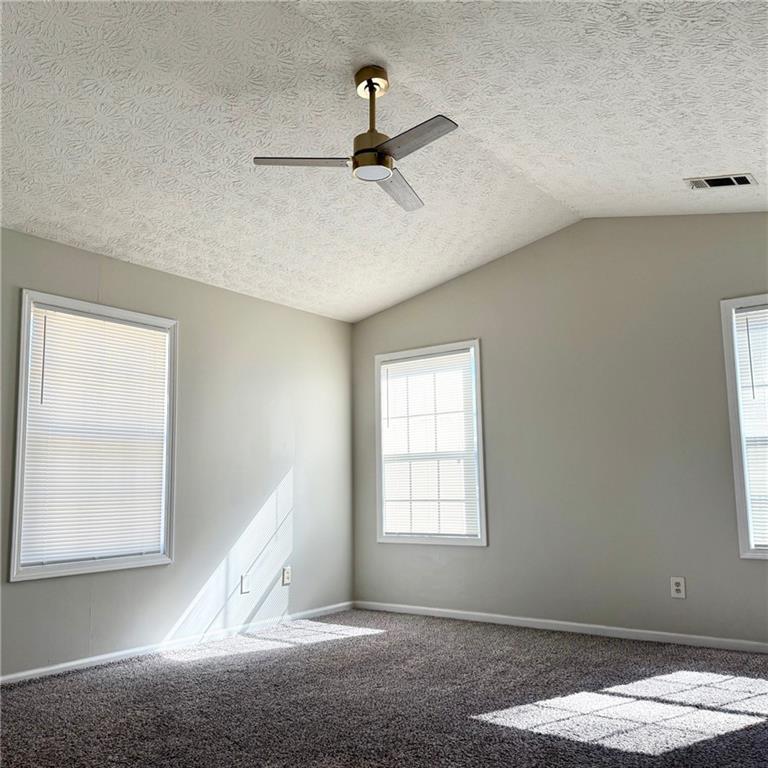 524 Julius Drive Stone Mountain, GA 30087 - Photo 12 of 17 a view of a livingroom with wooden floor and a window