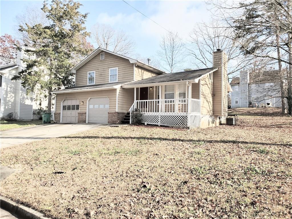 524 Julius Drive Stone Mountain, GA 30087 - Photo 15 of 17 a house with a outdoor space