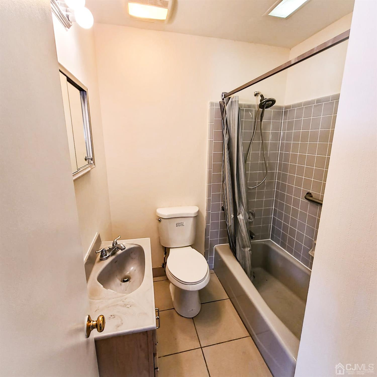 5 Brookside Road Edison, NJ 08817 - Photo 13 of 20 a bathroom with a toilet and a shower