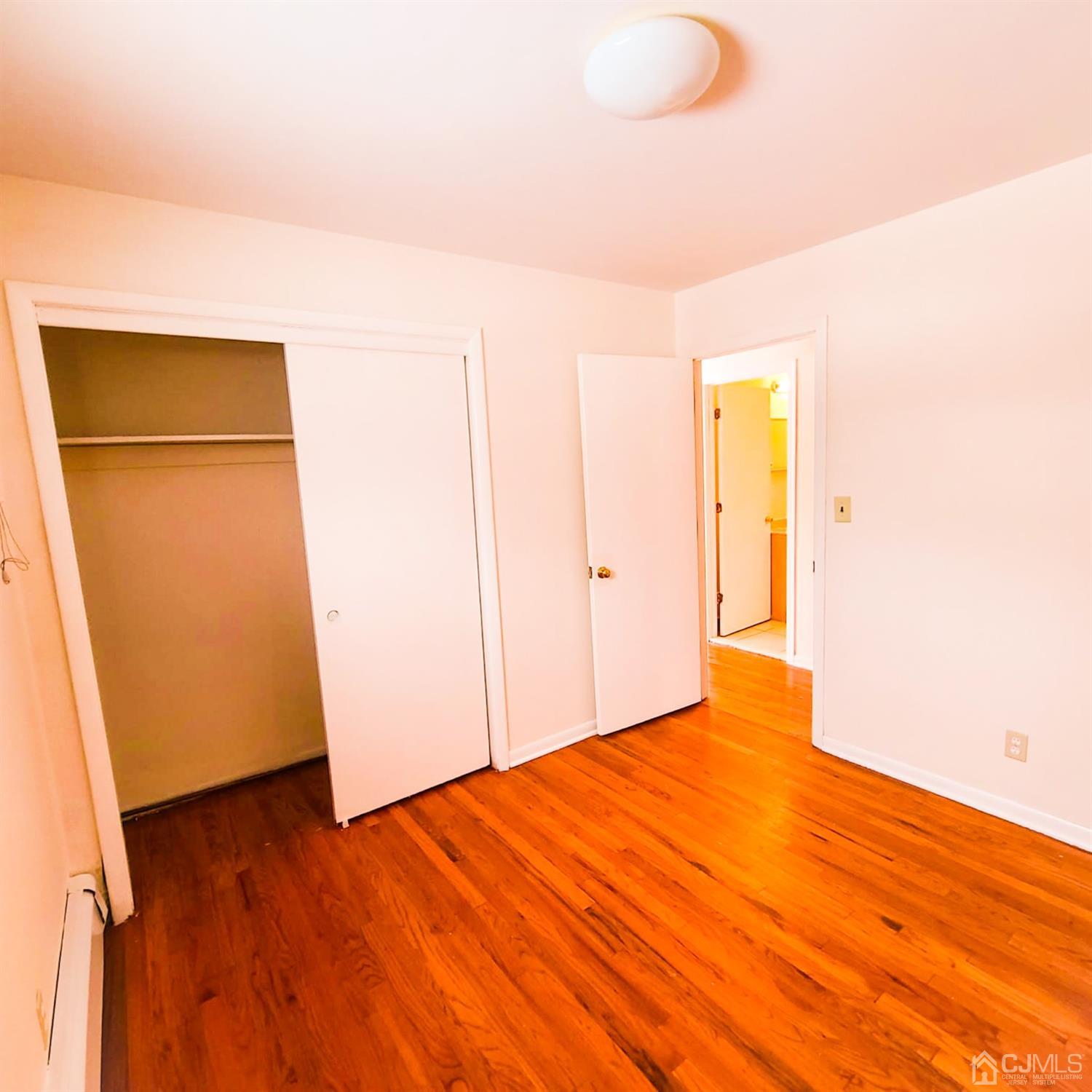 5 Brookside Road Edison, NJ 08817 - Photo 10 of 20 a view of empty room with wooden floor