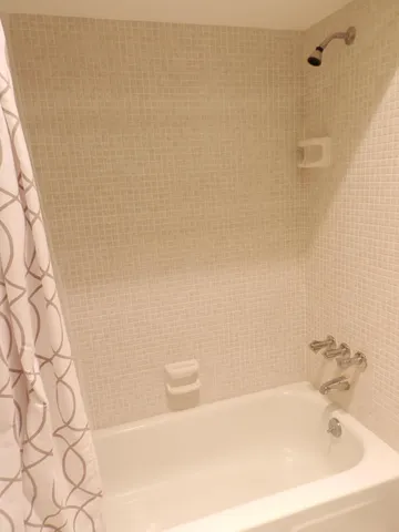 a bathroom with a bathtub