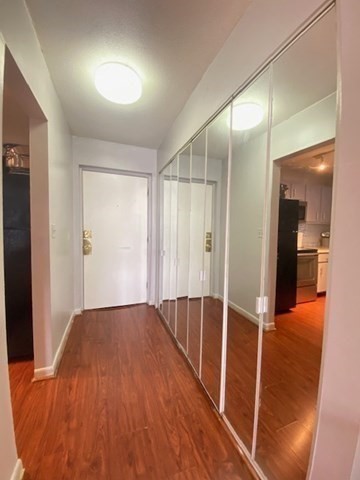 7 Weld Street, Unit 50 Framingham, MA 01702 - Photo 9 of 19 wooden floor in an empty room