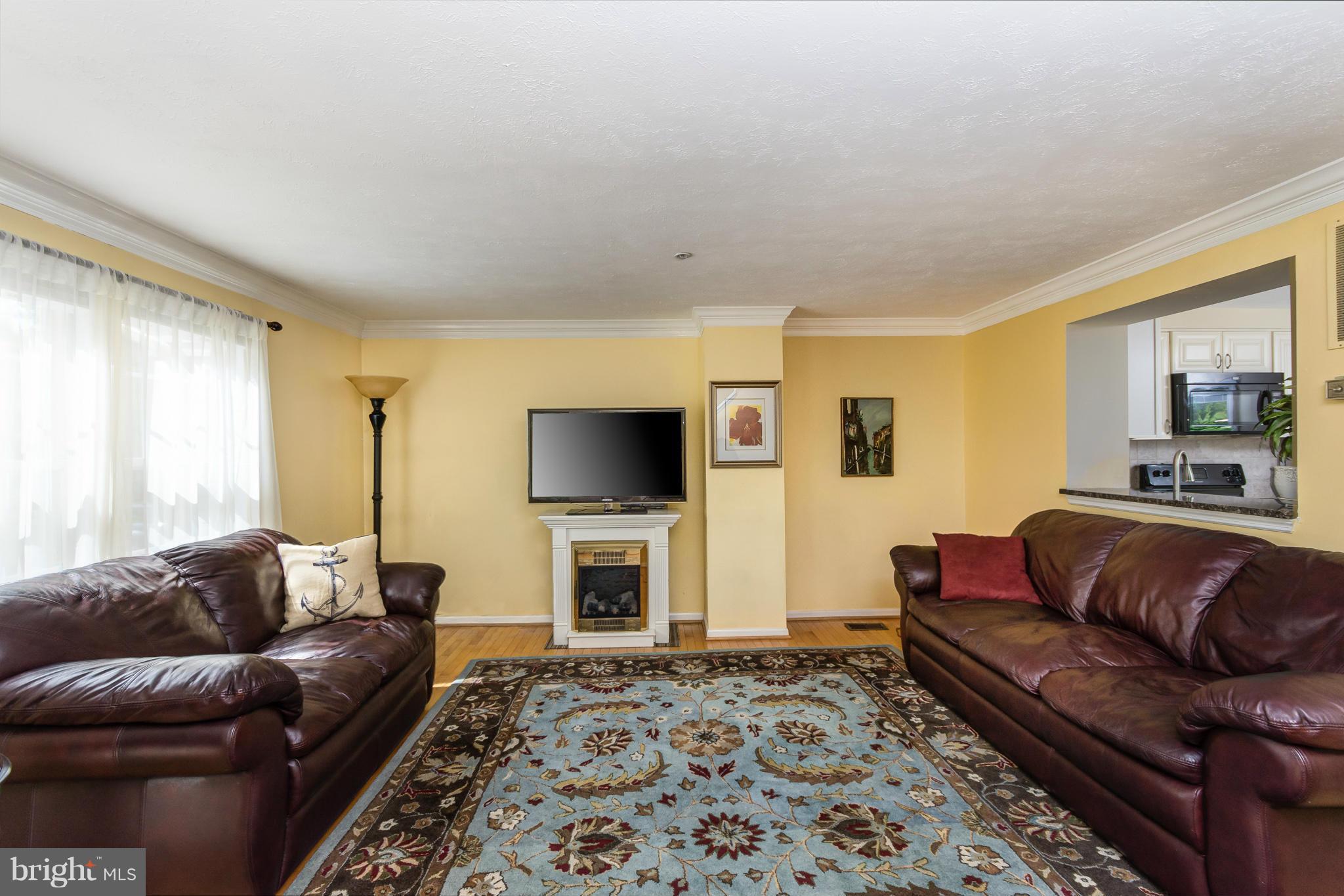 1234 Quaker Ridge Drive Arnold, MD 21012 - Photo 4 of 26 Living room has large front window for a light