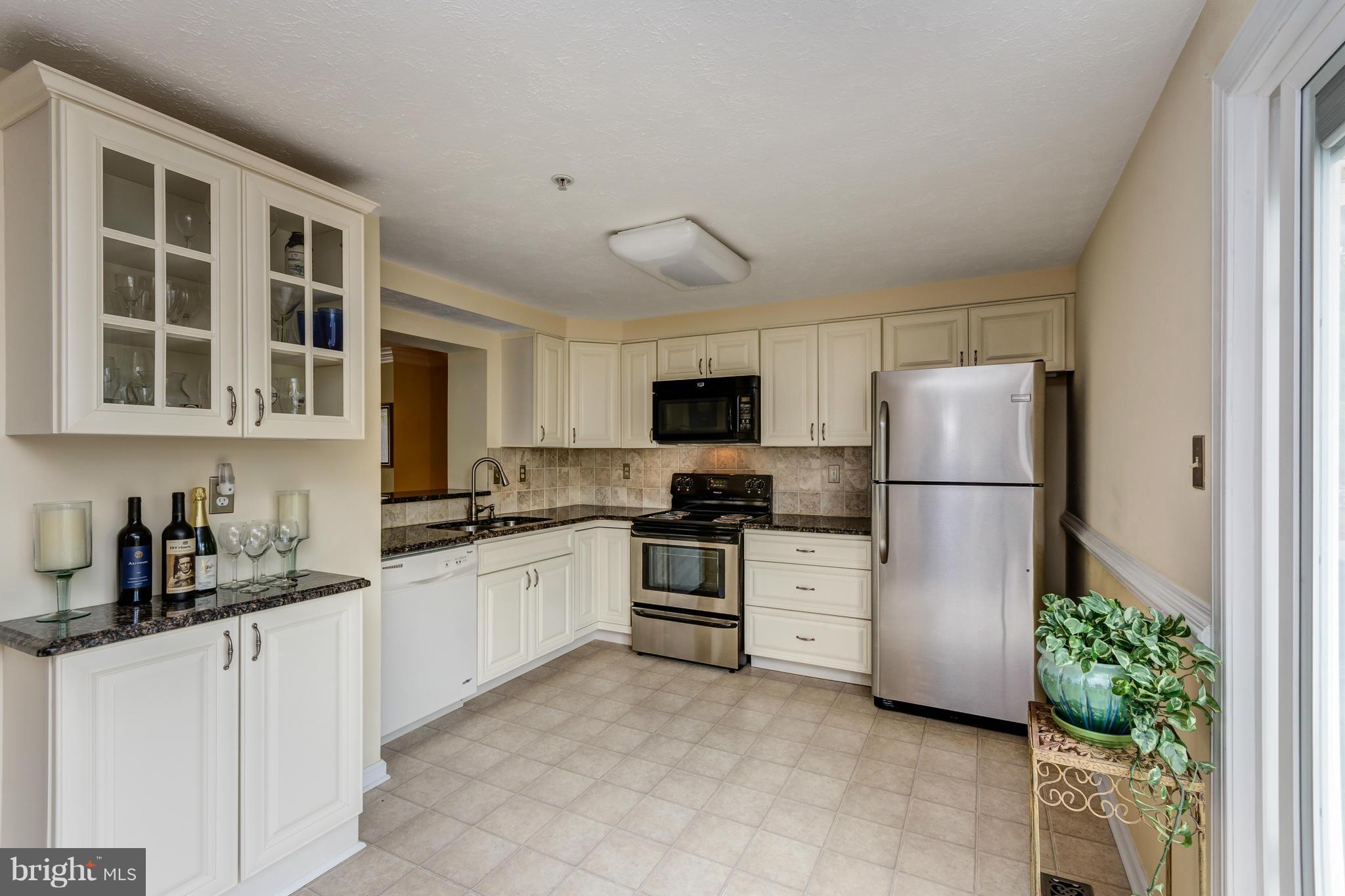 1234 Quaker Ridge Drive Arnold, MD 21012 - Photo 7 of 26 Newly remodeled kitchen. New granite countertops,