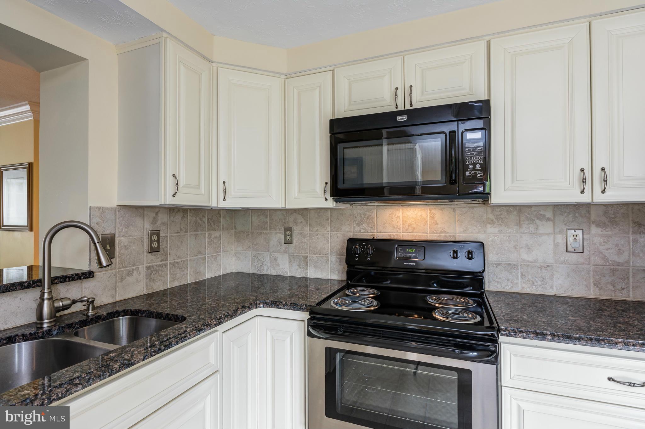 1234 Quaker Ridge Drive Arnold, MD 21012 - Photo 8 of 26 New light-finish cabinets offer plenty of storage